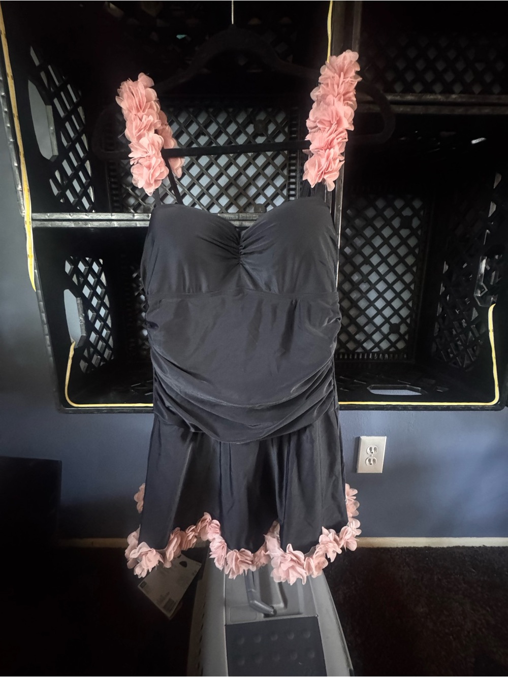 Black bathing suit  with pink ruffled trim with built in bottoms